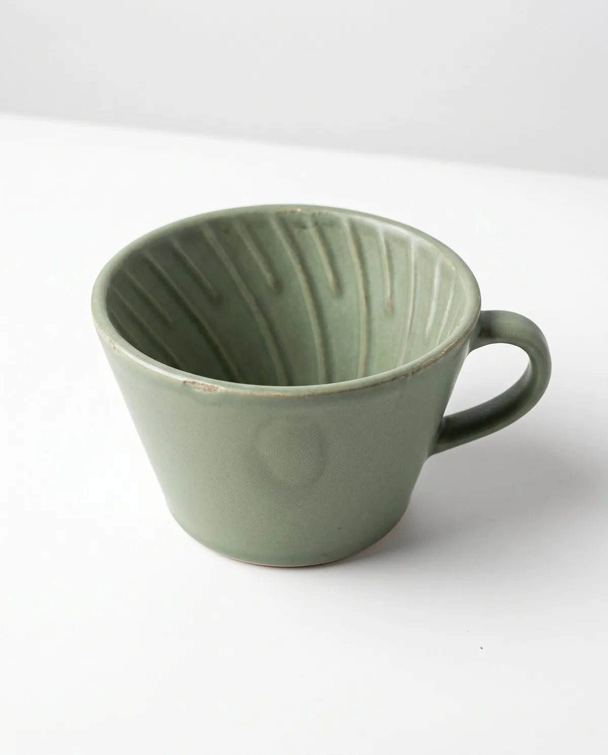 Sage green Vessel ceramic coffee dripper on white